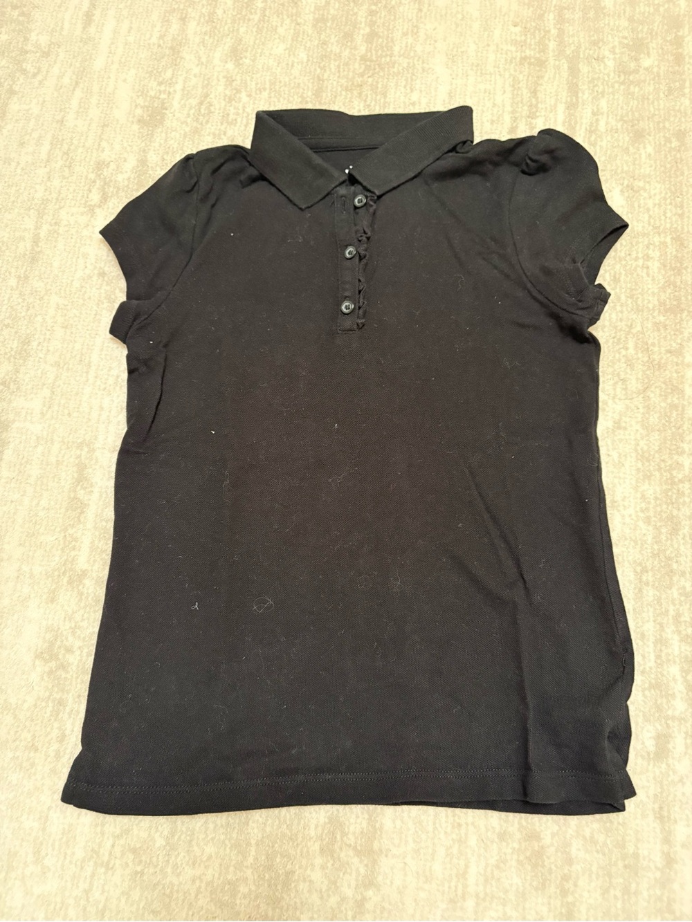 The Children's Place Black Short Sleeve Polo with ruffle trim. Size M (7-8)